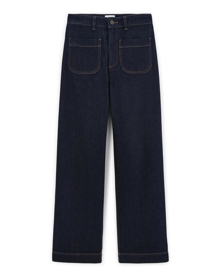 Jean femme en denim brut bleu foncé, coupe droite large, matière 100 % coton avec poches plaquées à l'avant, idéal pour toutes morphologies.