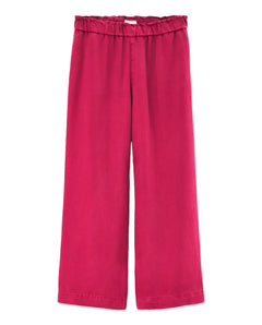 Pantalon femme en tencel rouge cerise, coupe large et fluide avec taille élastiquée pour un confort optimal et un style décontracté.