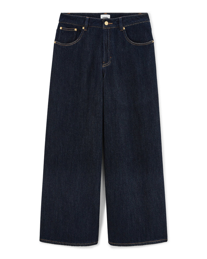 Jean large en denim bleu foncé 100 % coton avec une coupe droite ajustée, conçu pour s’adapter parfaitement à toutes les morphologies féminines.
