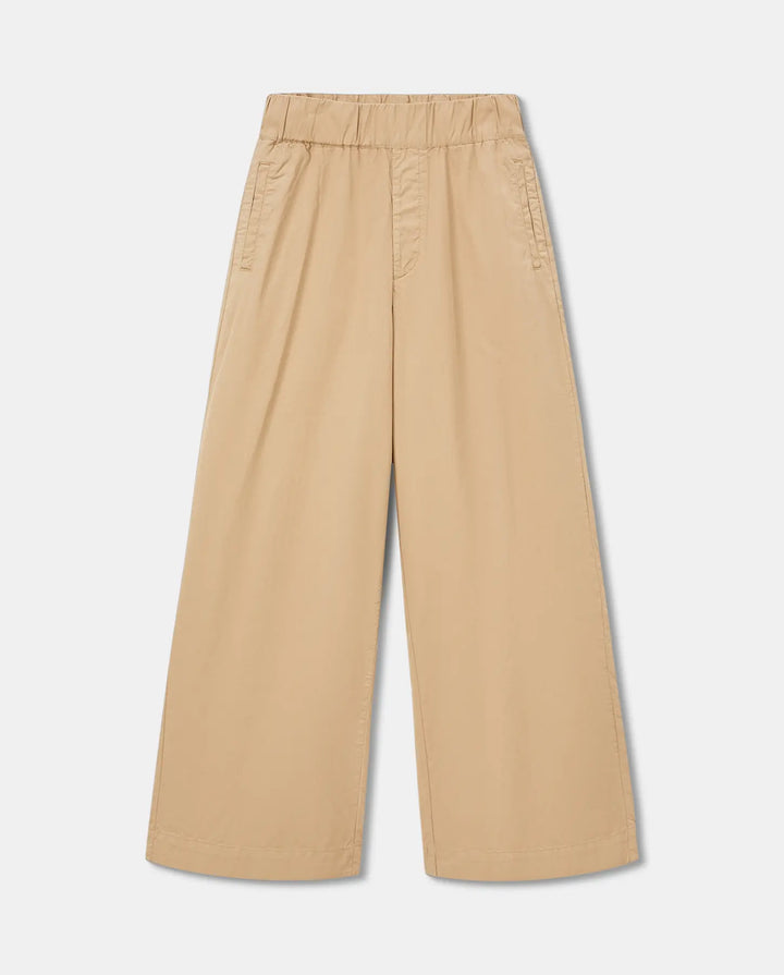 Pantalon large en popeline couleur praline, coupe fluide avec taille élastiquée, adapté à toutes les morphologies pour un maintien confortable et élégant.