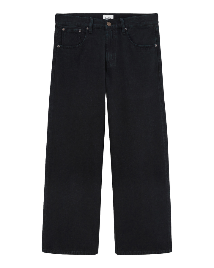 Jean femme en denim noir foncé, coupe large et droite, en coton 100%, offrant un tombé fluide et confortable adapté à toutes les morphologies.