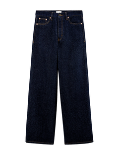 Jean en denim brut de couleur bleu foncé, coupe large et droite, en coton épais offrant un tombé fluide et adapté à toutes les morphologies féminines.