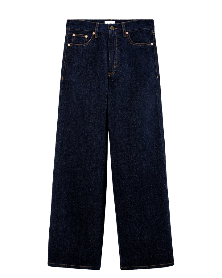 Jean en denim brut de couleur bleu foncé, coupe large et droite, en coton épais offrant un tombé fluide et adapté à toutes les morphologies féminines.